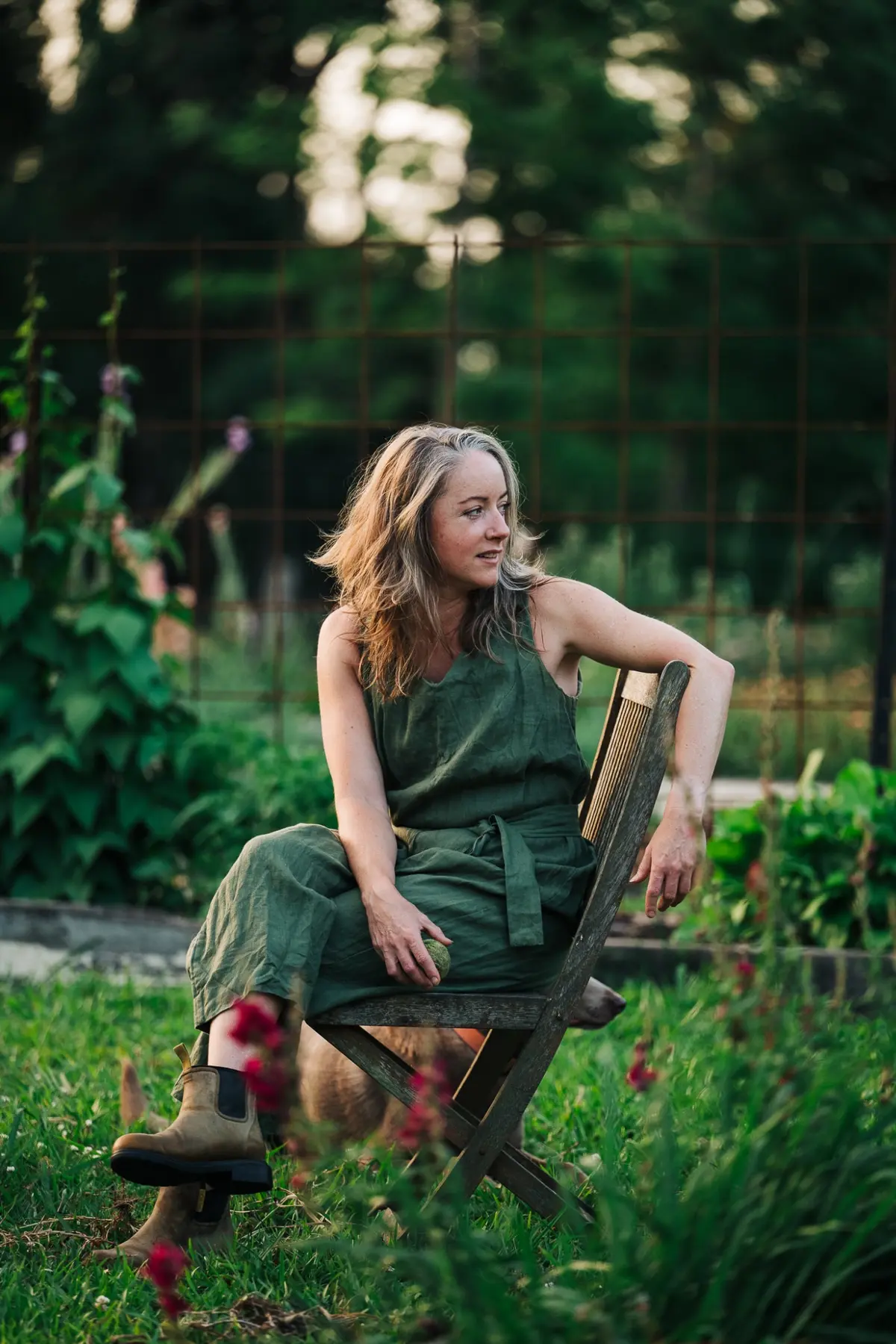 Ambre Whatley seated in her garden
